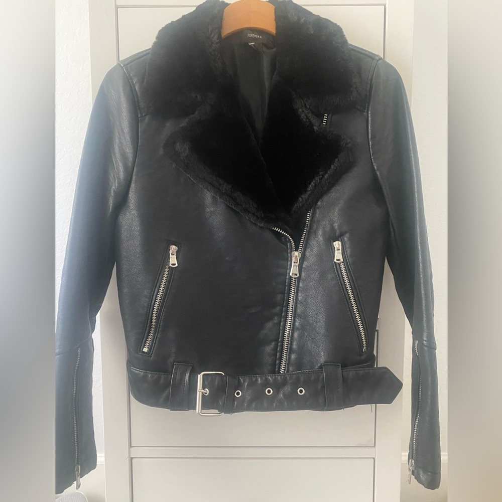 Faux leather motorcycle jacket with faux fur collar.